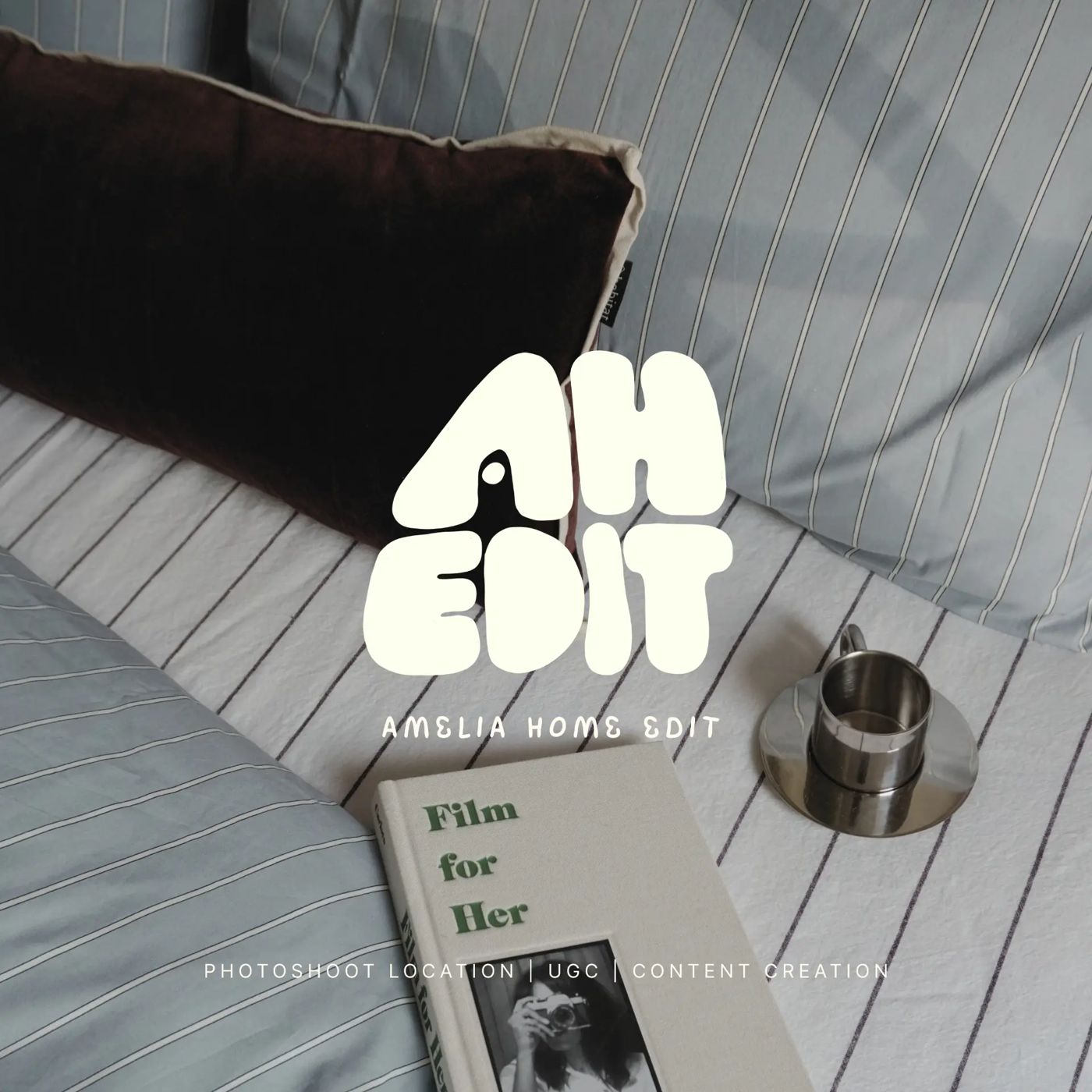 AH EDIT logo over striped bedding, a velvet cushion and a steel cup
